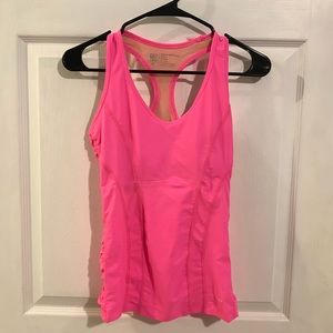 Two Albion Fit workout tanks